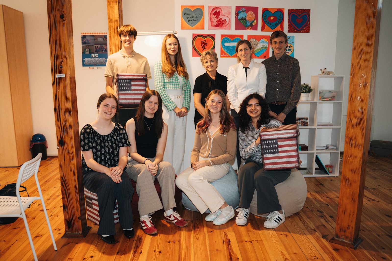Students and guests posing for a group photo at the center